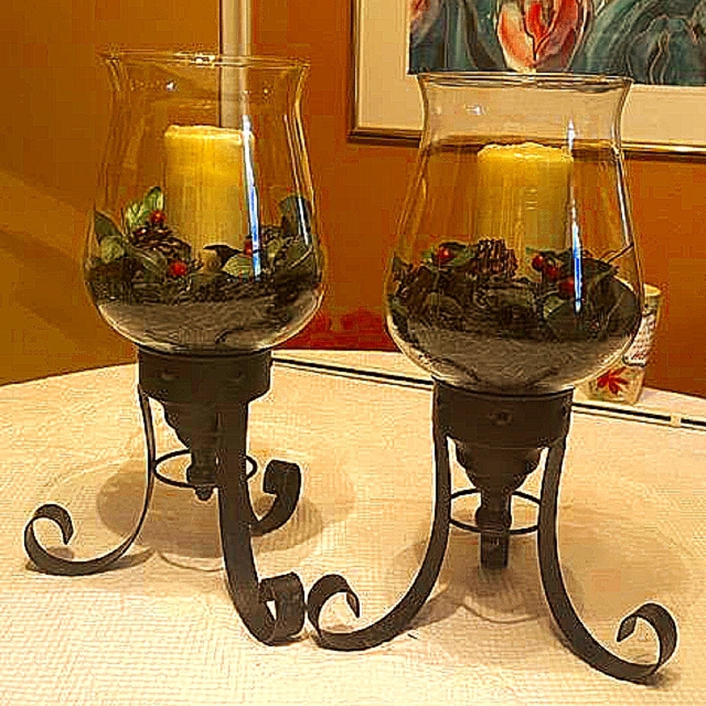 2 18 inch tall and 33 inch at base Hurricanes currently Christmas Candle theme